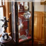 F30. Curio cabinet.